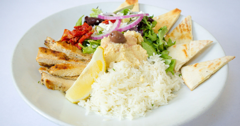 Greek bowl closeup, chicken, rice and various veggies