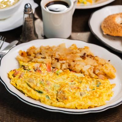 Garden omelet with home fries.
