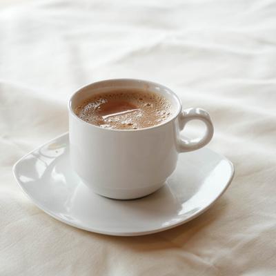 Cup of chai served on the table.