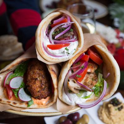 Several burritos with different fillings