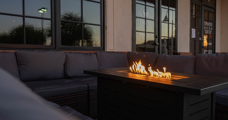 Exterior, seating place around fire on patio