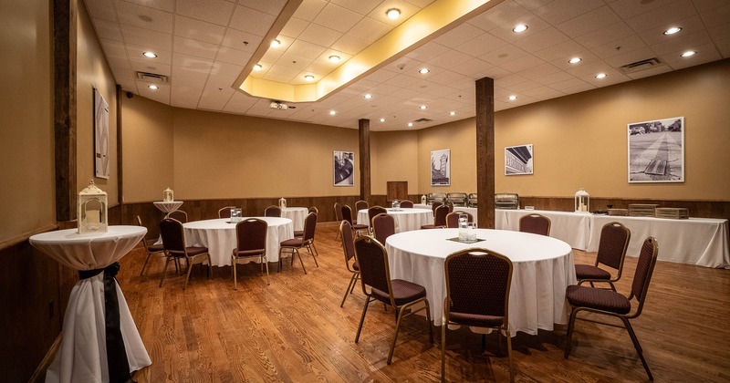 The interior, tables set for dining