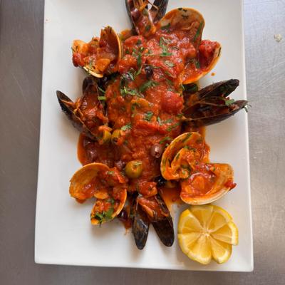 Seafood dish of Mussels and Clams in tomato sauce.