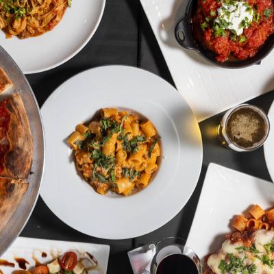 Various types of dishes displayed on the table, overhead view.