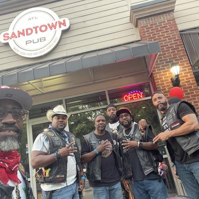 Guests in leather vests.