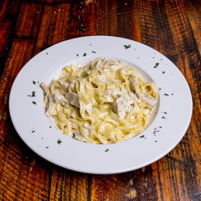 Chicken pasta in Alfredo sauce.