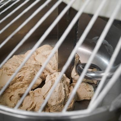 Dough kneading machine.