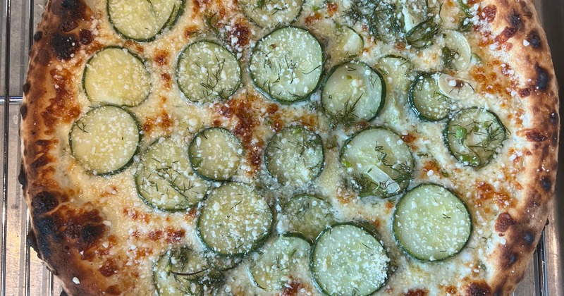 White sauce, homemade dill pickles, garlic, mozzarella, parmesan