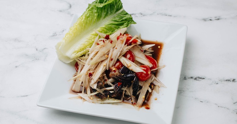 Thai Papaya Salad served on the table