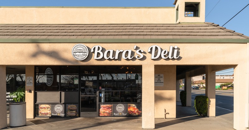 Exterior, entrance to restaurant, sign above