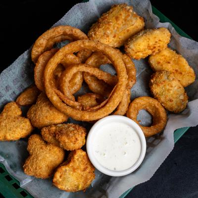 Fried appetizers with dip.