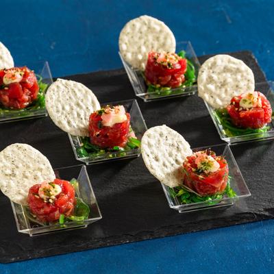 Ahi Tuna Tartare, Seaweed Salad, Wasabi Aioli, Pickled Ginger, Rice Cracker.