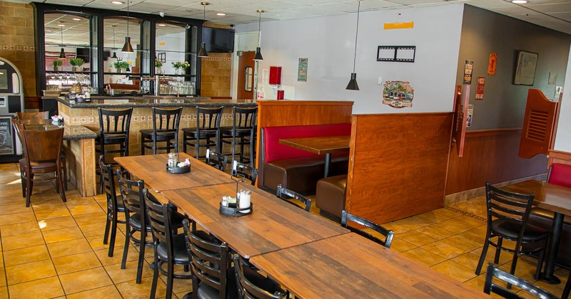 Interior, seating tables, restaurant booth and bar