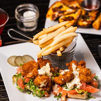 Micky's Po boy with shrimp and a side of fries.