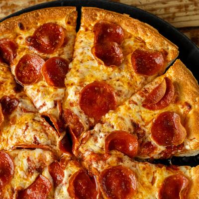 A close-up view of a pepperoni pizza.