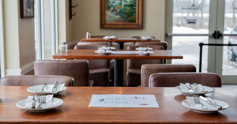 Interior, wooden tables and leather chairs