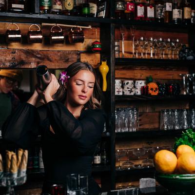 Bartender mixing a cocktail.