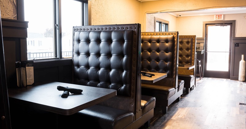 Interior, high back button tufted leather booths