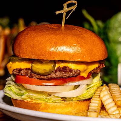 Beelmans burger served with crinkle fries.