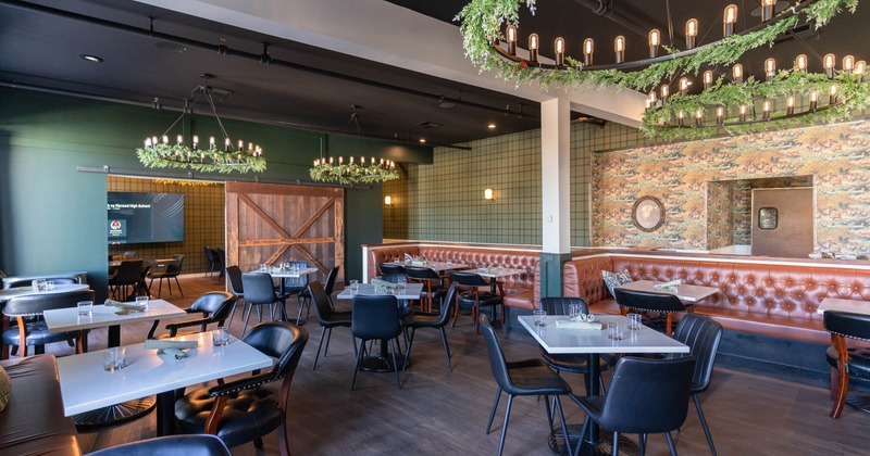 Interior, tables, chairs and sofas ready for guests