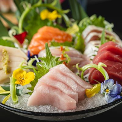 Served Sashimi combo, side view.