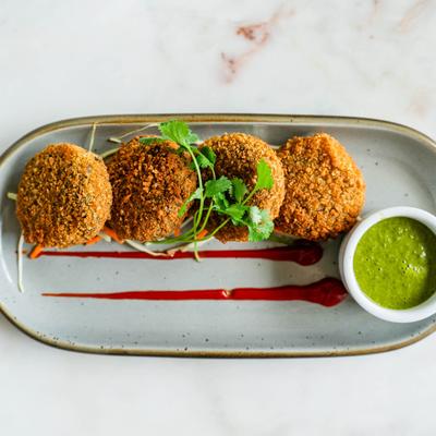 Hara Bhara Kebab - fried patties made with spinach, peas and potatoes.