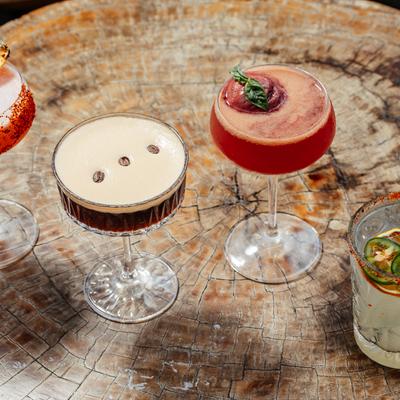 Espresso martini and other cocktails on a table.