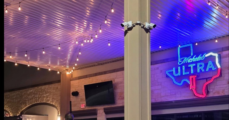 View at the entrance with restaurant's sign