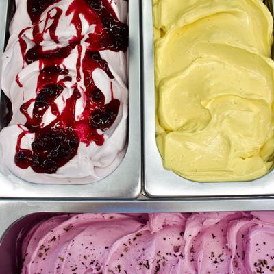 Ice cream display cabinet filled with gelato, top view.