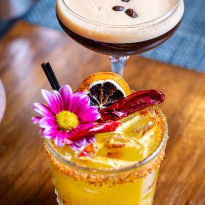 Orange cocktail drink and Espresso martini.