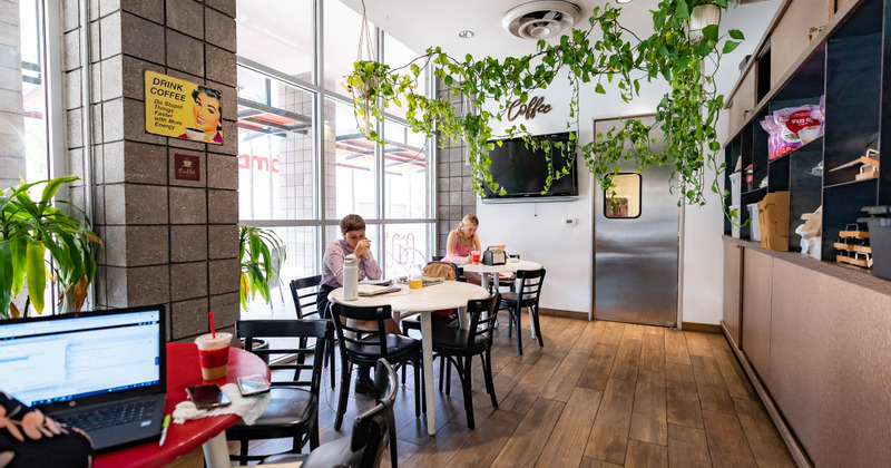 Interior, two guests enjoying their drinks