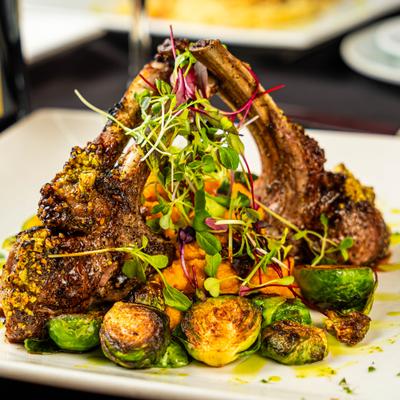 Rack of lamb with vegetables.