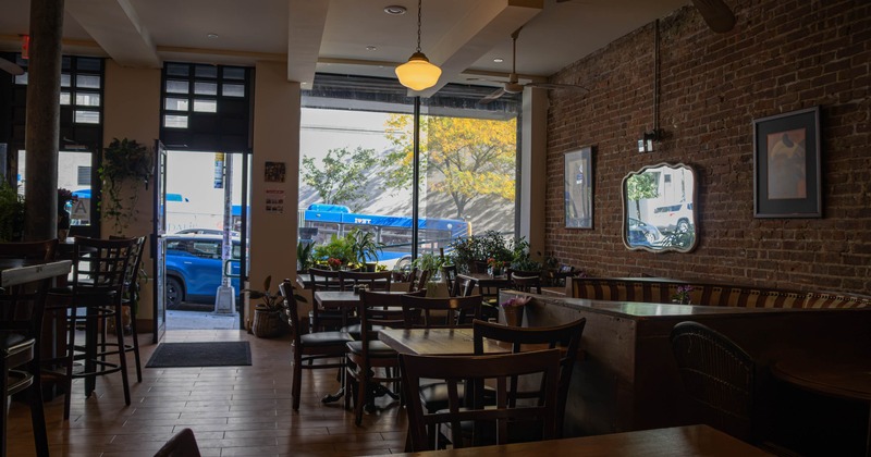 Interior, dining area, tables with chairs, restaurant entrance and shop window