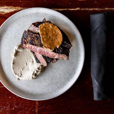 Steak served with smoked cauliflower puree.