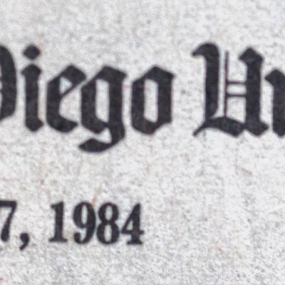 A close-up of a newspaper clipping with the printed year 1984