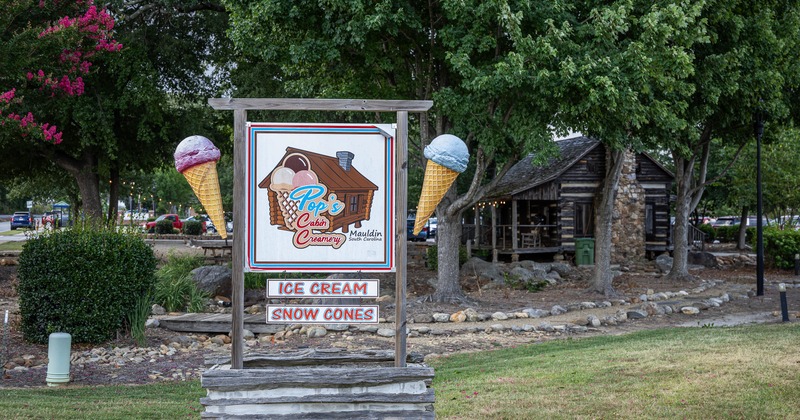 Ice cream parlor signage decorated with ice cream cones