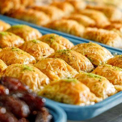 Pistachio baklavas on a tray.