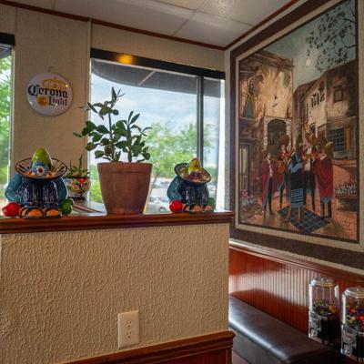 Interior with festive decor and artwork.