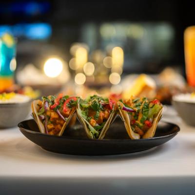 Plate of tacos served on the table.