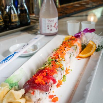 Mangosteen Roll, accompanied with sake.