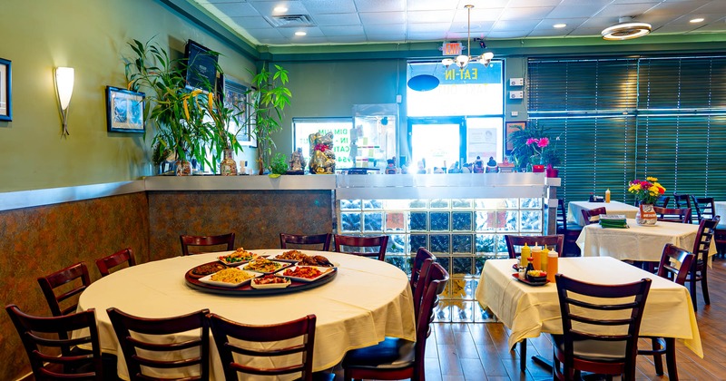 Interior, tables and chairs ready for guests