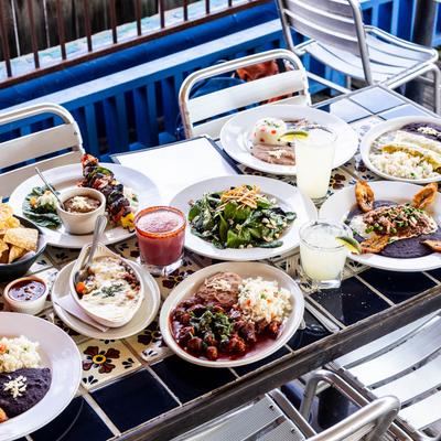 Various dishes and drinks on a table.