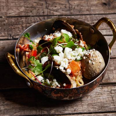 A pot with clam dish.