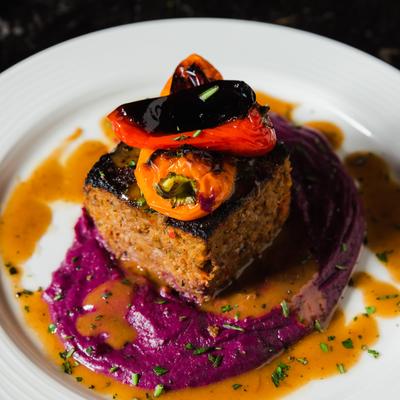 Beef and Italian sausage meatloaf, with purple sweet potato puree, and roasted peppers