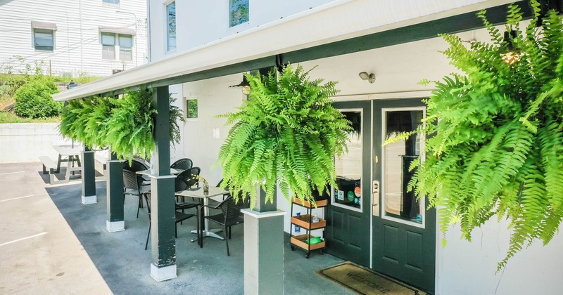 Exterior, tables and chairs on a porch