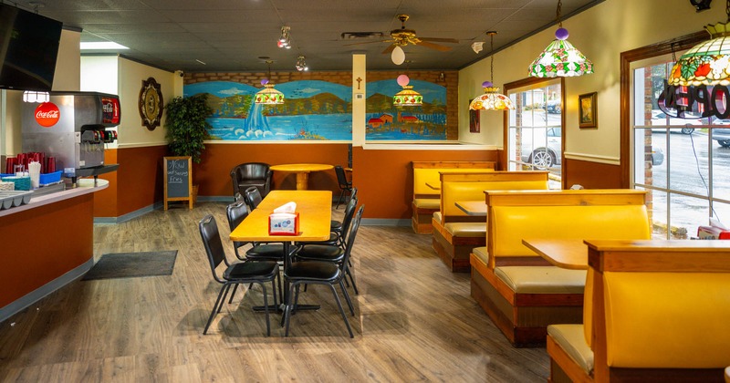 Interior, dining area, tables ready for guests