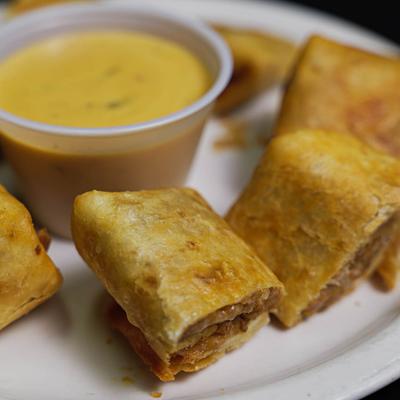 Beef mini burritos and dip.