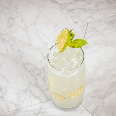 A glass of fresh squeezed lemonade.