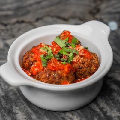 Meatballs served with marinara.