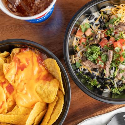 Nachos, and steak salad.